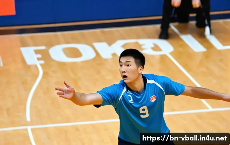 배구 경기에서의 규칙 위반 사례 - An action shot of a male volleyball player in a blue jersey and athletic shorts, attempting a set. H...